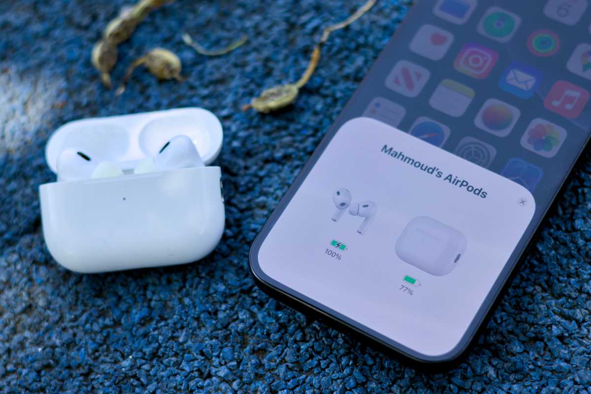 AirPods Pro 2 next to iPhone 16 Pro Max