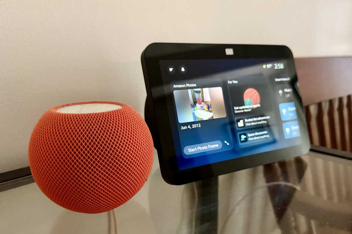 Apple HomePod next to Amazon Echo Show
