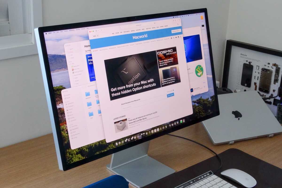 Apple Studio Display on a desk with the macworld home page open